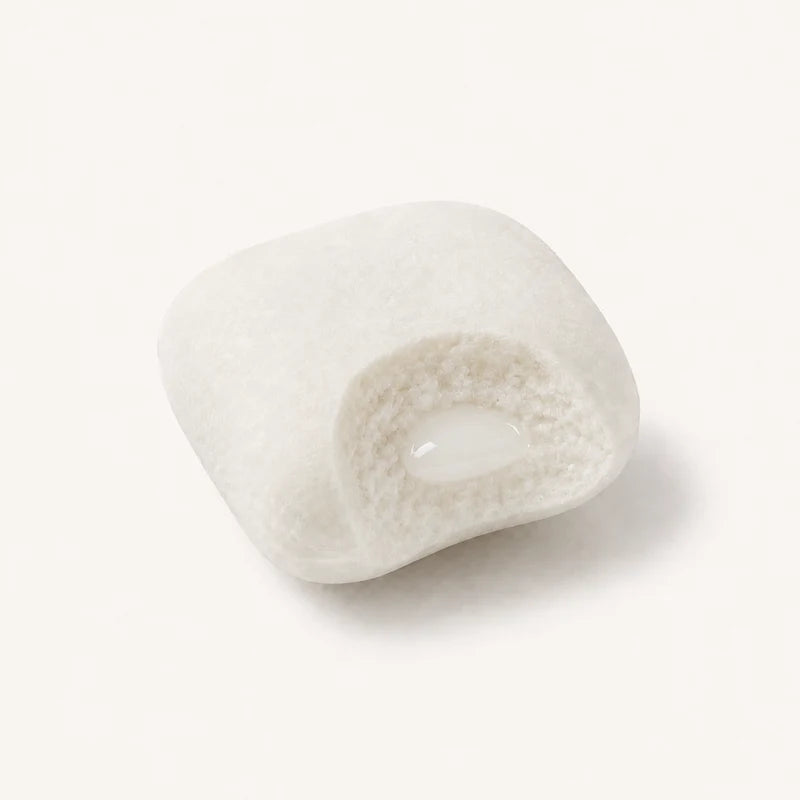 Illustrated cutaway of white gum with a milky liquid core